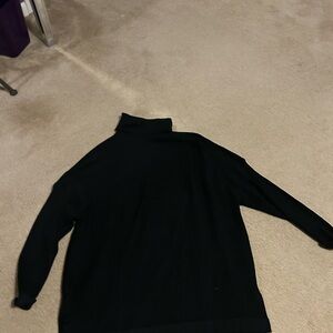 Woman’s Black Turtleneck Sweater